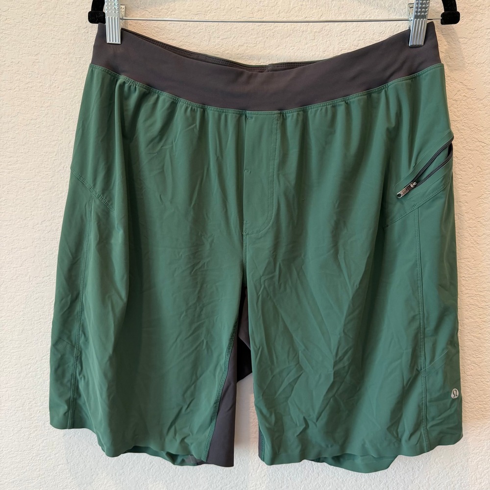 Lululemon Mens Green Athletic Training Shorts Size L Zipper Pocket Running